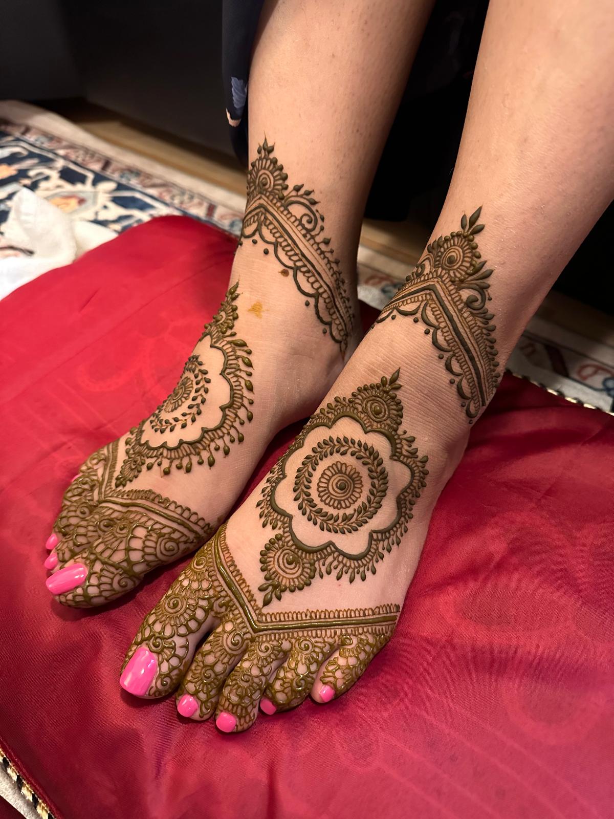 Feet henna design with intricate patterns