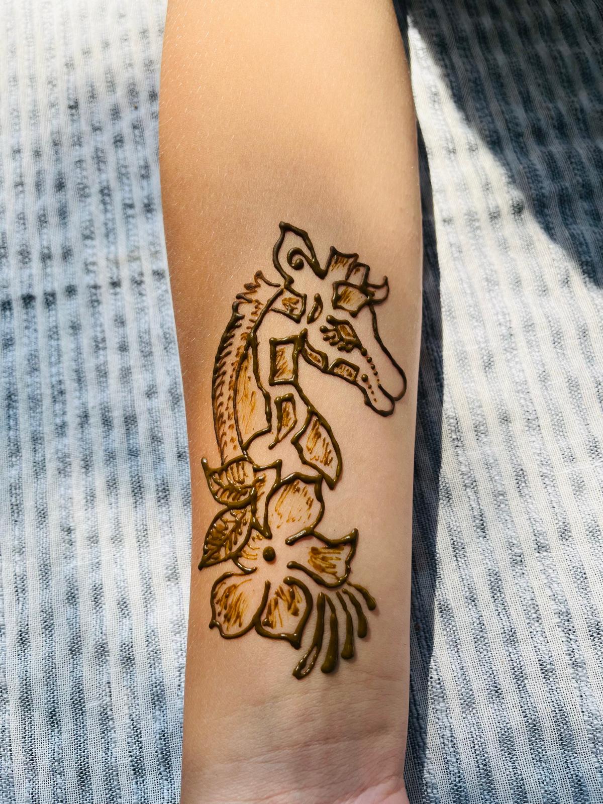 Henna design created for a child at a kids party
