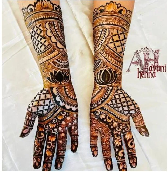 Intricate bridal mehndi henna design on feet by Avani Henna